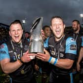Glasgow Warriors' Pete Horne, right, and Chris Fusaro celebrate with the Pro12 trophy after the win over Munster in the 2015 final in Belfast.  (Photo: Gary Hutchison/SNS)
