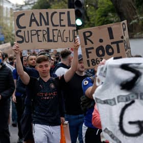 Football supporters demonstrated against the proposed European Super League outside of Stamford Bridge.