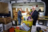 From left: Simon McMahon of Amazon, Pauline Buchan of The Cottage Family Centre, and former PM Gordon Brown. Picture: contributed.