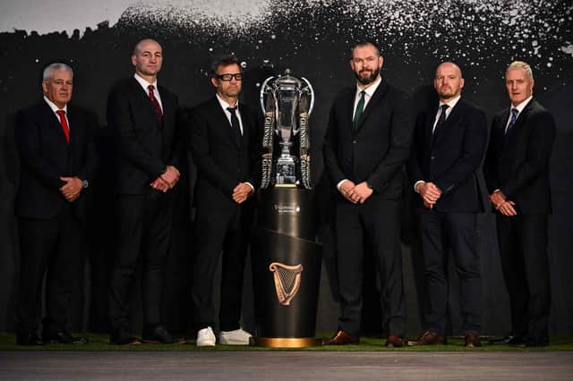 From left: Wales' Warren Gatland, England's Steve Borthwick, France's Fabien Galthie, Ireland's Andy Farrell, Scotland's Gregor Townsend and Italy's Kieran Crowley pose with the Six Nations trophy. (Photo by Ben Stansall / AFP)