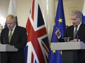 Prime Minister Boris Johnson (left) and Finland's President Sauli Niinisto, at a press conference at the Presidential Palace in Helsinki, Finland.