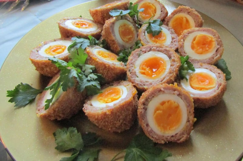 A Scotch Egg is a boiled egg that is wrapped up in sausage meat and breadcrumbs before being deep-fried (as should be expected in Scotland where deep-frying food is a well-known custom, look no further than ‘deep fried Mars Bars’...) As written by Jamie Oliver, Scotch Eggs are “perfect for a picnic or a party.”