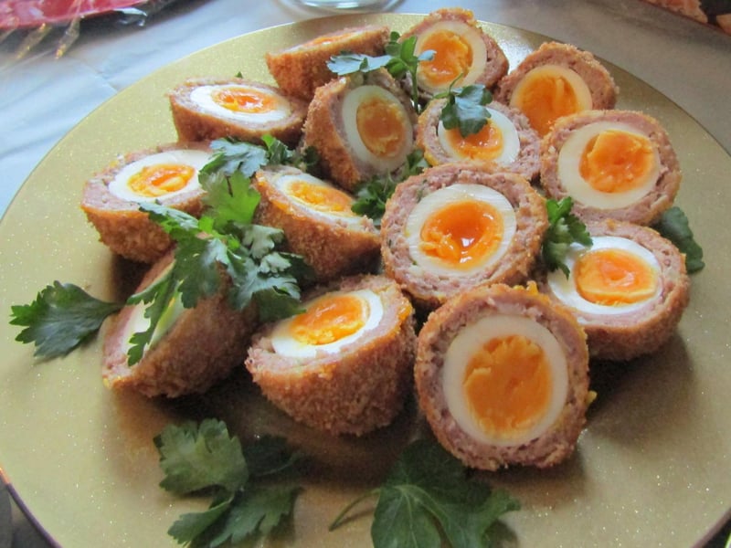 A Scotch Egg is a boiled egg that is wrapped up in sausage meat and breadcrumbs before being deep-fried (as should be expected in Scotland where deep-frying food is a well-known custom, look no further than ‘deep fried Mars Bars’...) As written by Jamie Oliver, Scotch Eggs are “perfect for a picnic or a party.”
