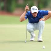 Grant Forrest lines up a putt during the DP World Tour Championship on the Earth Course at Jumeirah Golf Estates in Dubai. Picture: Andrew Redington/Getty Images.