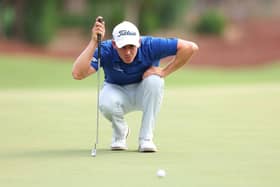 Grant Forrest lines up a putt during the DP World Tour Championship on the Earth Course at Jumeirah Golf Estates in Dubai. Picture: Andrew Redington/Getty Images.