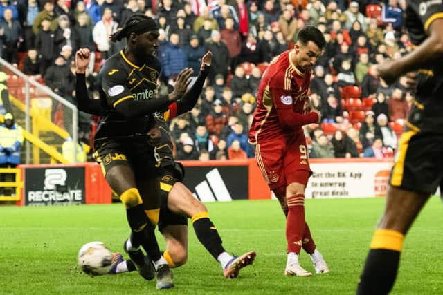 Bojan Miovski scores his and Aberdeen's second in the 2-1 win over Livingston at Pittodrie. (Photo by Paul Devlin / SNS Group)