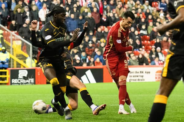 Bojan Miovski scores his and Aberdeen's second in the 2-1 win over Livingston at Pittodrie. (Photo by Paul Devlin / SNS Group)
