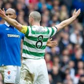 Celtic captain Scott Brown (right) celebrates his strike in front of El Hadji Diouf to give birth to 'the Broony' in his most iconic derby act, after scoring in the 2-2 Scottish Cup draw between the pair in February 2011. (Photo by Craig Williamson/SNS Group).