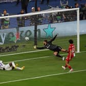 Real Madrid's Jose Vinicius Junior opens the scoring against Liverpool in the Champions League final.