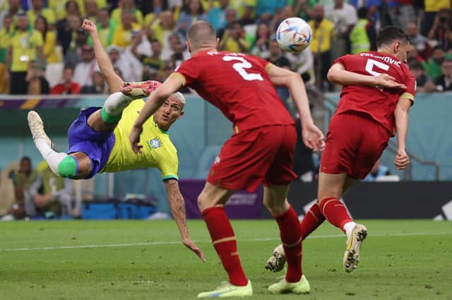 Brazil's Richarlison scores his spectacular bicycle kick in the 2-0 win over Serbia at the Lusail Stadium. (Photo by ADRIAN DENNIS/AFP via Getty Images)