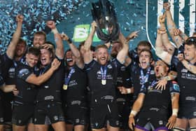 Glasgow Warriors captain Kyle Steyn lifts the trophy after winning the United Rugby Championship (URC) final against The Bulls at Loftus Versfeld Stadium in Pretoria. (Photo by PHILL MAGAKOE/AFP via Getty Images)