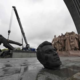The Soviet monument to Ukraine-Russia friendship being dismantled in Kyiv.