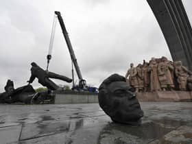 The Soviet monument to Ukraine-Russia friendship being dismantled in Kyiv.