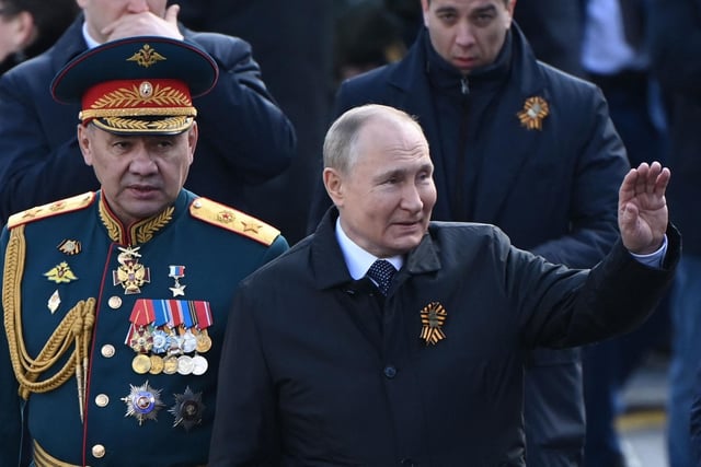 Russian President Vladimir Putin and Defence Minister Sergei Shoigu leave Red Square after the Victory Day military parade in central Moscow on May 9, 2022. -Picture Kirill Kudryavtsev via Getty Images)