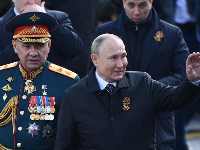 Russian President Vladimir Putin and Defence Minister Sergei Shoigu leave Red Square after the Victory Day military parade in central Moscow on May 9, 2022. -Picture Kirill Kudryavtsev via Getty Images)