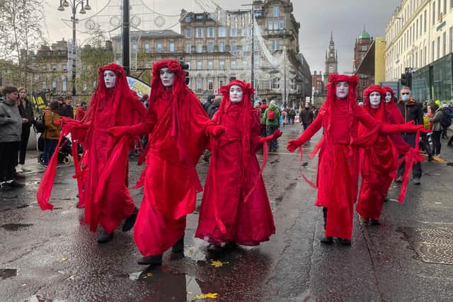 Protesters took the the streets of Glasgow to call for urgent action to curb climate change as world leaders met in the city for the UN's COP26 summit last November