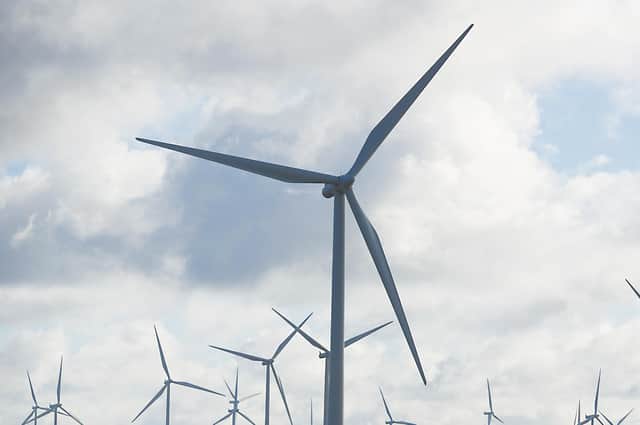 Wind farms and their turbines have become a familiar sight in many parts of Scotland these days. Picture: John Devlin