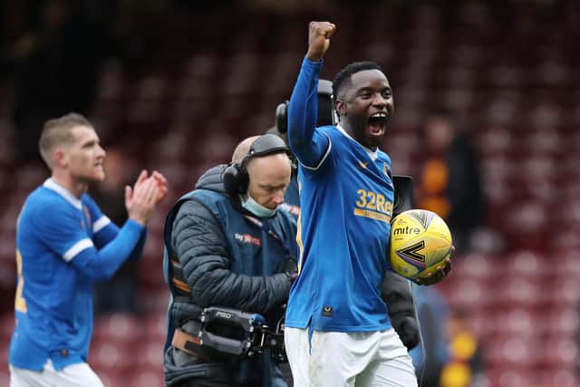 Rangers hat-trick hero Fashion Sakala celebrates with the match ball after the 6-1 win over Motherwell at Fir Park. (Photo by Ian MacNicol/Getty Images)
