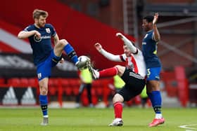 Scotland team-mates Stuart Armstrong and John Fleck challenge for the ball during a Southampton v Sheffield United match.