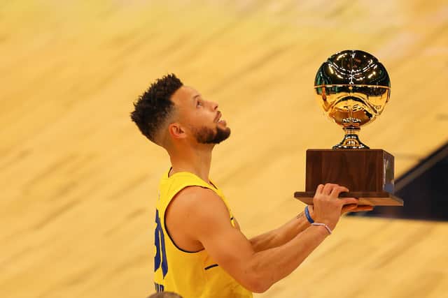 Steph Curry celebrates after winning the NBA All-Star three-point contest.