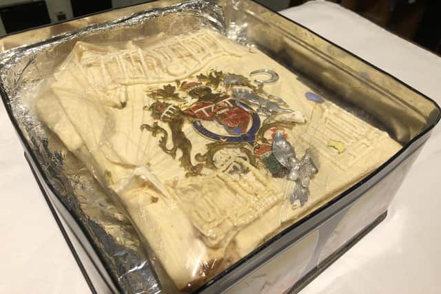 The tin containing a slice of cake from one of the 23 official wedding cakes made for the Royal Wedding of HRH Prince Charles and Lady Diana Spencer on Wednesday 29th July 1981.