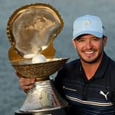 Ewen Ferguson shows off the trophy after winning the Commercial Bank Qatar Masters at Doha Golf Club. Picture: Stuart Franklin/Getty Images.