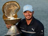 Ewen Ferguson shows off the trophy after winning the Commercial Bank Qatar Masters at Doha Golf Club. Picture: Stuart Franklin/Getty Images.