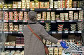 Before supermarkets, shoppers would go round lots of independent shops to pick up their weekly groceries. Pic: Getty