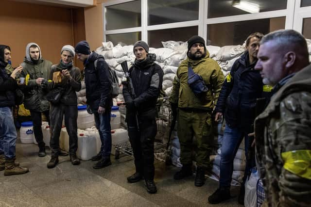 Members of a Territorial Defence unit prepare to deploy to various parts of the city on March 02, 2022 in Kyiv, Ukraine.