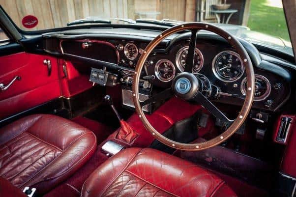 A fitting interior complete with the finest hide, veneer and wooden-rimmed steering wheel.