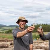 Archaeologists Daniel Rhodes and Derek Alexander from National Trust for Scotland with whisky tasting glasses found at the original 19th Century Glenlivet distillery. PIC: Alison White/NTS.
