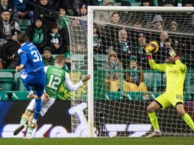 Hibs goalkeeper David Marshall saves from Rangers' Borna Barisic during the Ibrox side's 4-1 win at Easter Road. Photo by Mark Scates / SNS Group