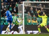 Hibs goalkeeper David Marshall saves from Rangers' Borna Barisic during the Ibrox side's 4-1 win at Easter Road. Photo by Mark Scates / SNS Group