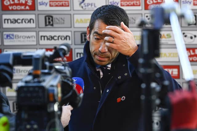 Rangers manager Giovanni van Bronckhorst speaks to Sky Sports at full time after the 2-1 defeat to St Johnstone. (Photo by Rob Casey / SNS Group)