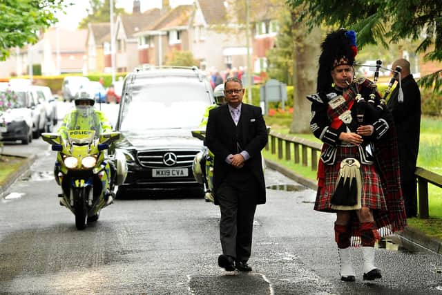 Funeral of Sandy Marr. Police motorbikes leading the hearse. Pic: Fife Photo Agency.