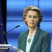 European Commission President Ursula von der Leyen listens to a question during an online news conference at the end of a EU summit at the European Council building in Brussels, Thursday, March 25, 2021. European Union leaders struggled Thursday to solve quarrels about the distribution of COVID-19 vaccine shots as they tried to ramp up inoculations across their 27 nations amid a shortage of doses, spikes in new cases and a feud with the United Kingdom. (Aris Oikonomou, Pool Photo via AP)