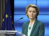 European Commission President Ursula von der Leyen listens to a question during an online news conference at the end of a EU summit at the European Council building in Brussels, Thursday, March 25, 2021. European Union leaders struggled Thursday to solve quarrels about the distribution of COVID-19 vaccine shots as they tried to ramp up inoculations across their 27 nations amid a shortage of doses, spikes in new cases and a feud with the United Kingdom. (Aris Oikonomou, Pool Photo via AP)