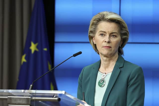 European Commission President Ursula von der Leyen listens to a question during an online news conference at the end of a EU summit at the European Council building in Brussels, Thursday, March 25, 2021. European Union leaders struggled Thursday to solve quarrels about the distribution of COVID-19 vaccine shots as they tried to ramp up inoculations across their 27 nations amid a shortage of doses, spikes in new cases and a feud with the United Kingdom. (Aris Oikonomou, Pool Photo via AP)