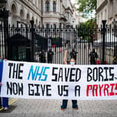 NHS staff protest about the underfunding of the NHS and other issues outside the gates of Downing Street in London protest (Picture: Aaron Chown/PA Wire)