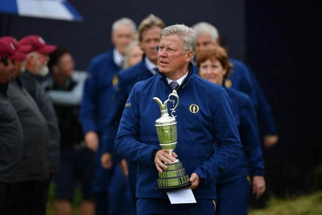 R&A chief executive Martin Slumbers brings out the Claret Jug for the trophy presentation at the 148th Open at Royal Portrush in 2019. Picture: Stuart Franklin/Getty Images.