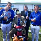 Jim Lawrie with three generations of his family