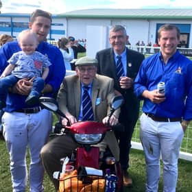 Jim Lawrie with three generations of his family