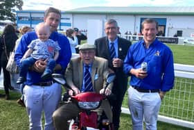 Jim Lawrie with three generations of his family