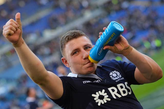 Duncan Weir gestures to Scotland supporters as he celebrates the win over Italy.