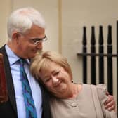 Alistair Darling hugs wife Maggie outside number 11 Downing Street on 24 March 2010 before presenting his last Budget as Labour Chancellor of the Exchequer (Picture: Peter Macdiarmid/Getty Images)