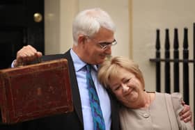 Alistair Darling hugs wife Maggie outside number 11 Downing Street on 24 March 2010 before presenting his last Budget as Labour Chancellor of the Exchequer (Picture: Peter Macdiarmid/Getty Images)