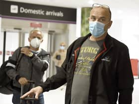 Passengers arriving at Edinburgh Airport on Monday as the quarantine restrictions were introduced. Picture: Lisa Ferguson.