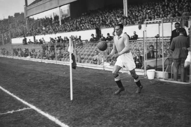 Rangers captain Jimmy Simpson takes to the field at Highbury for the match against Arsenal in September 1936.  (Photo by A. Hudson/Topical Press Agency/Getty Images)