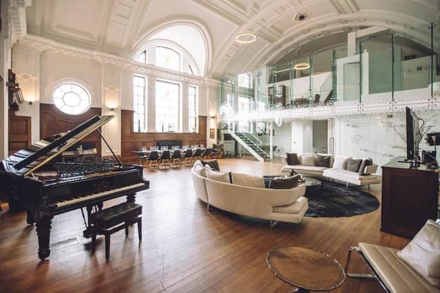 The spacious De Montfort Suite whose amenities include a triple-height ceiling, grand piano, statues made by sculptor Henry Poole, and a dining area for up to 20 people. Pic: Contributed