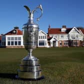 The Claret Jug sits beside the 18th green in front of the clubhouse at Muirfield, where The Open was last held in 2013. Picture: Ross Kinnaird/Getty Images.